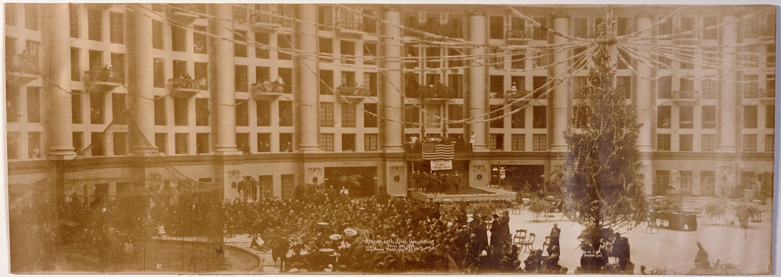 a crowd of people in front of a building