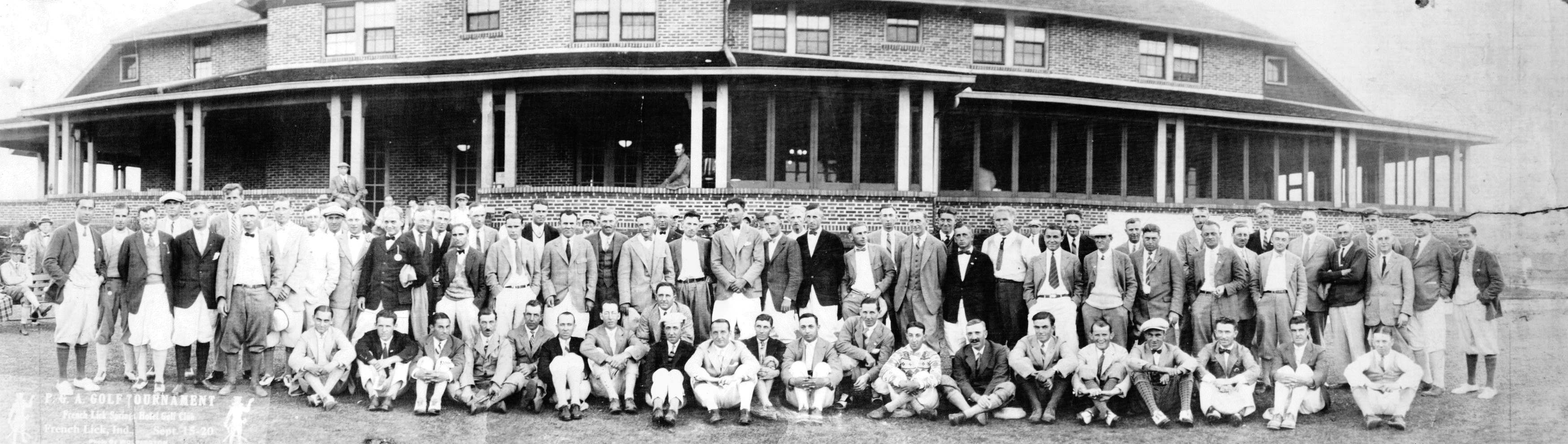 a group of men posing for a photo