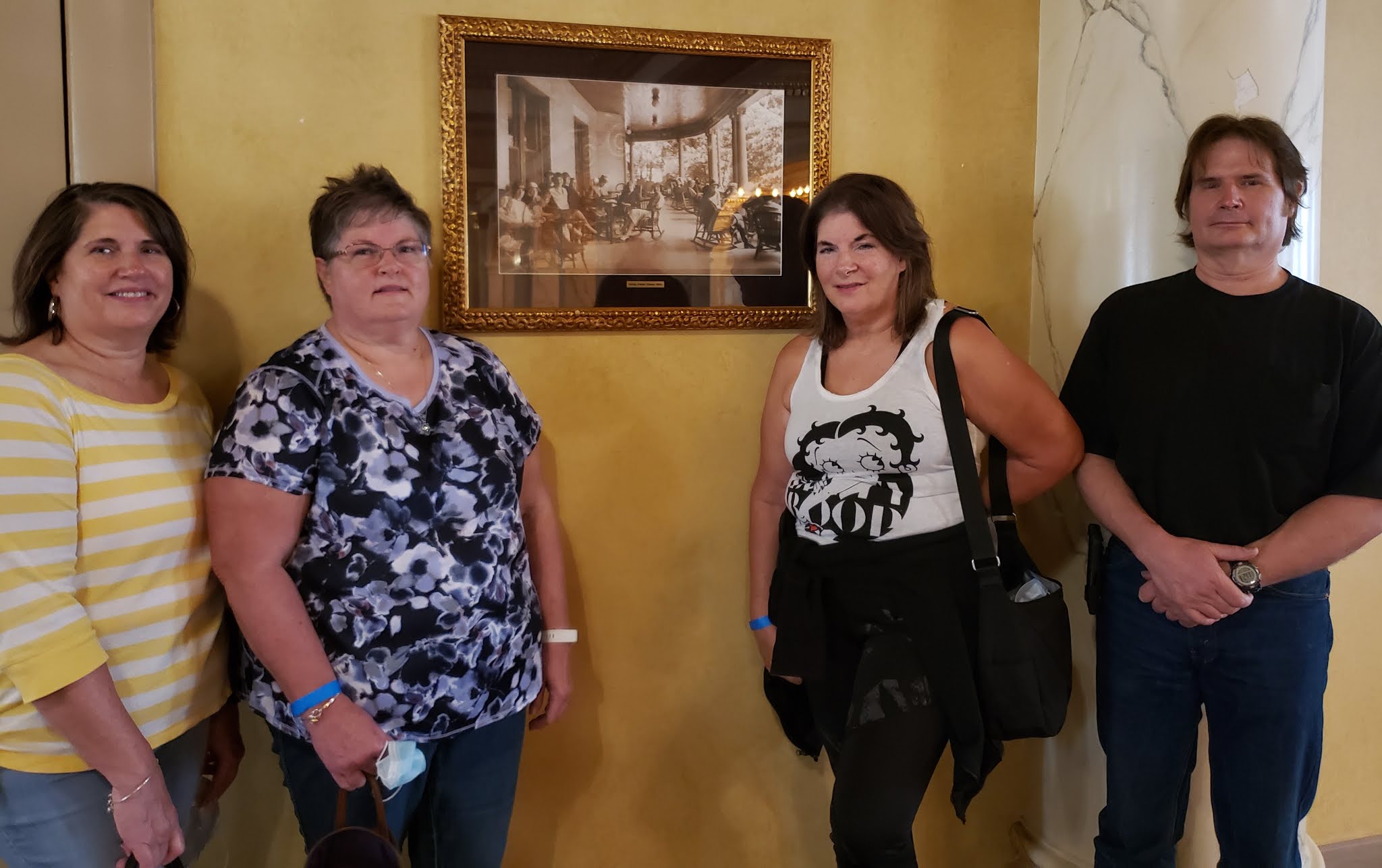 a group of people standing in a room