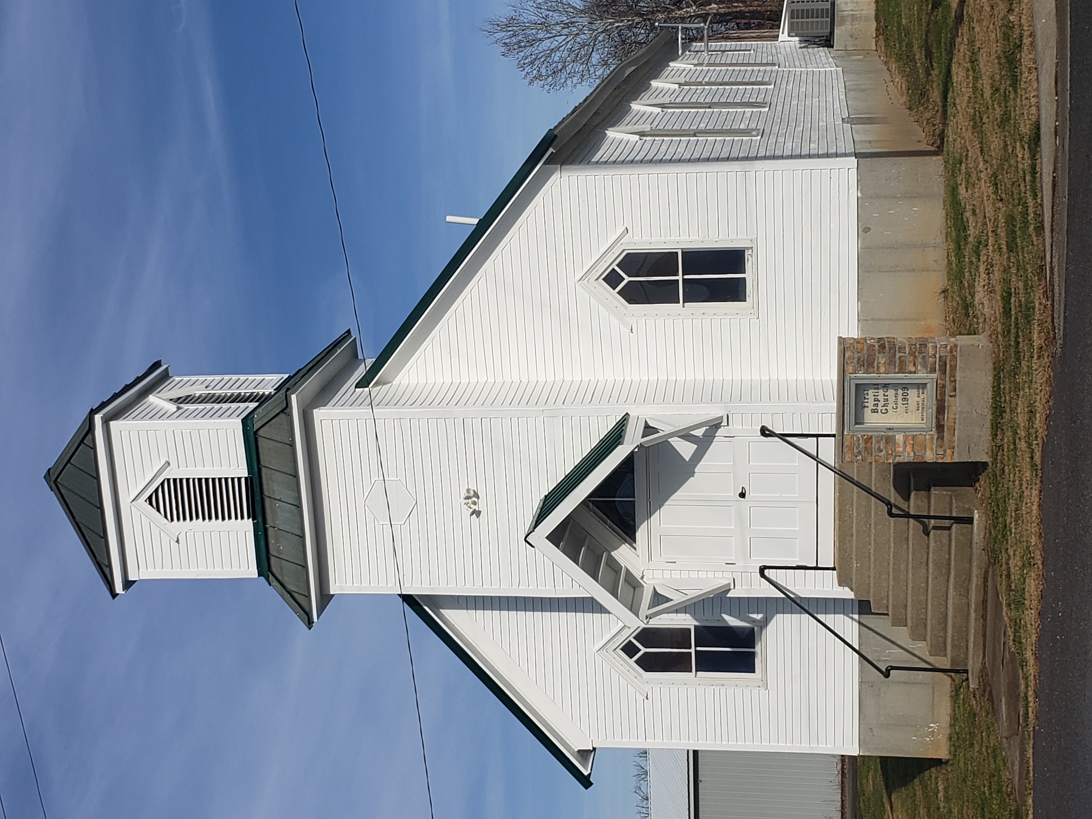 a white church with a steeple