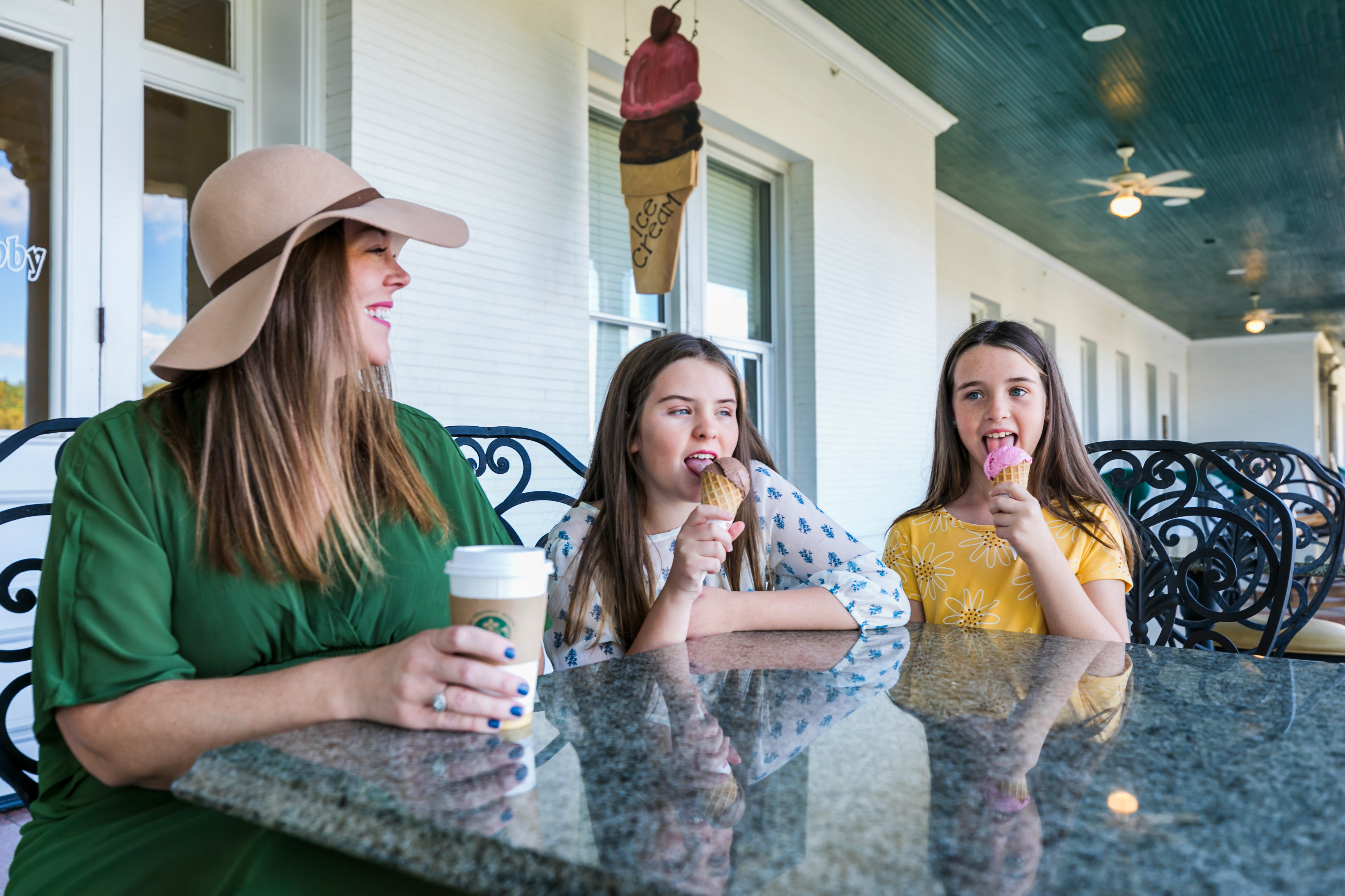 a group of women eating ice cream