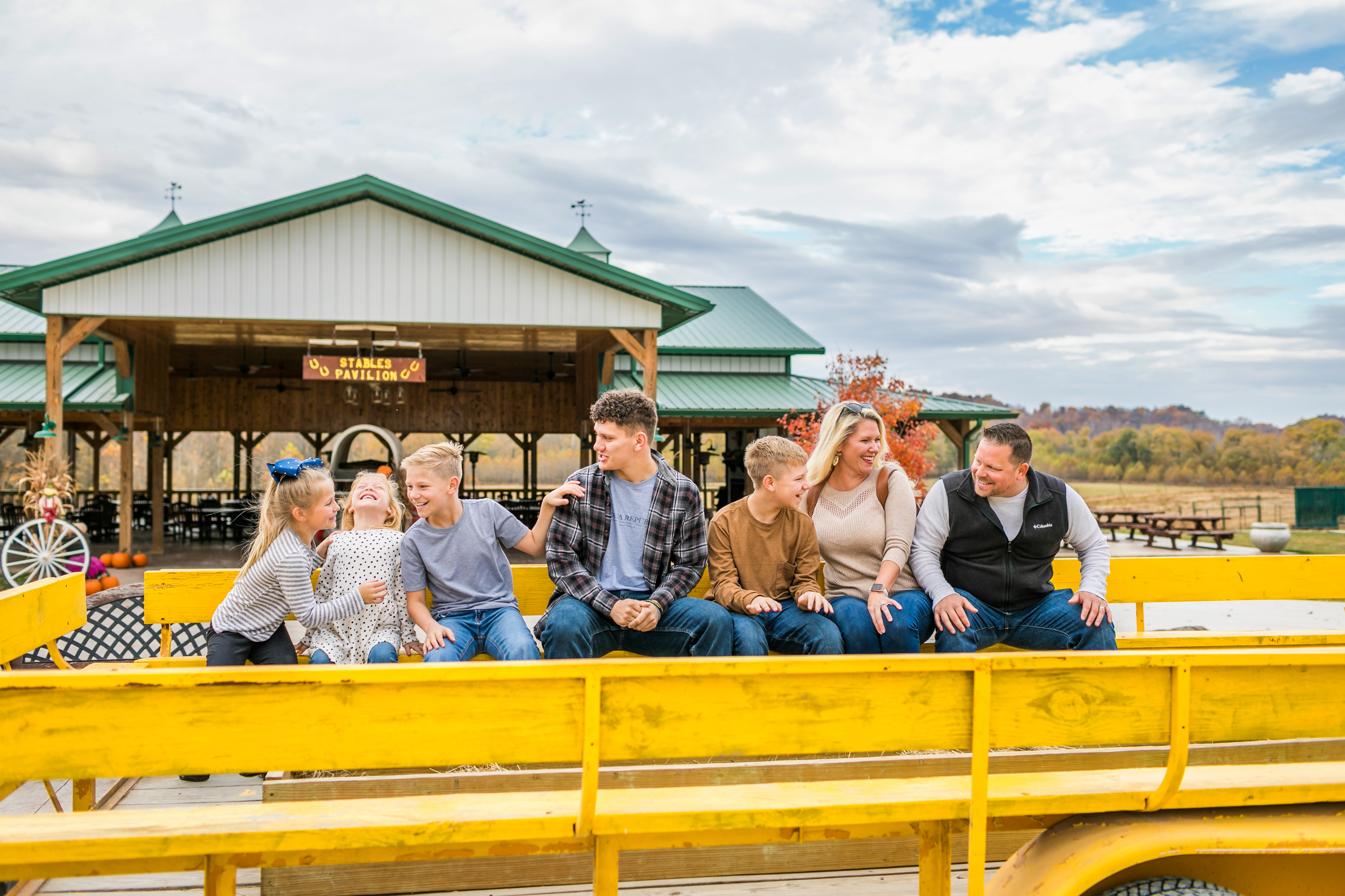 a group of people sitting on a bench