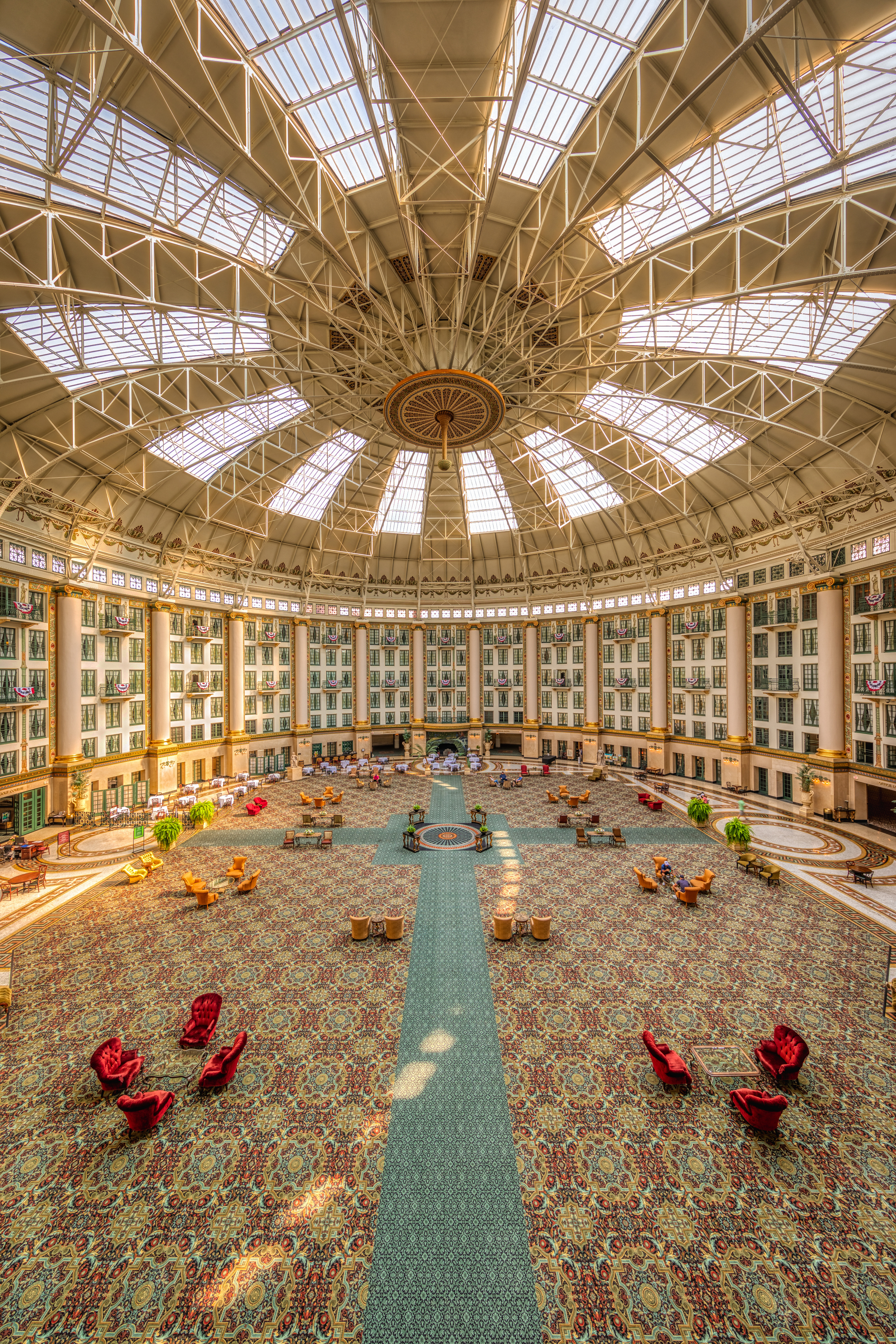 a large circular building with many windows and a large ceiling