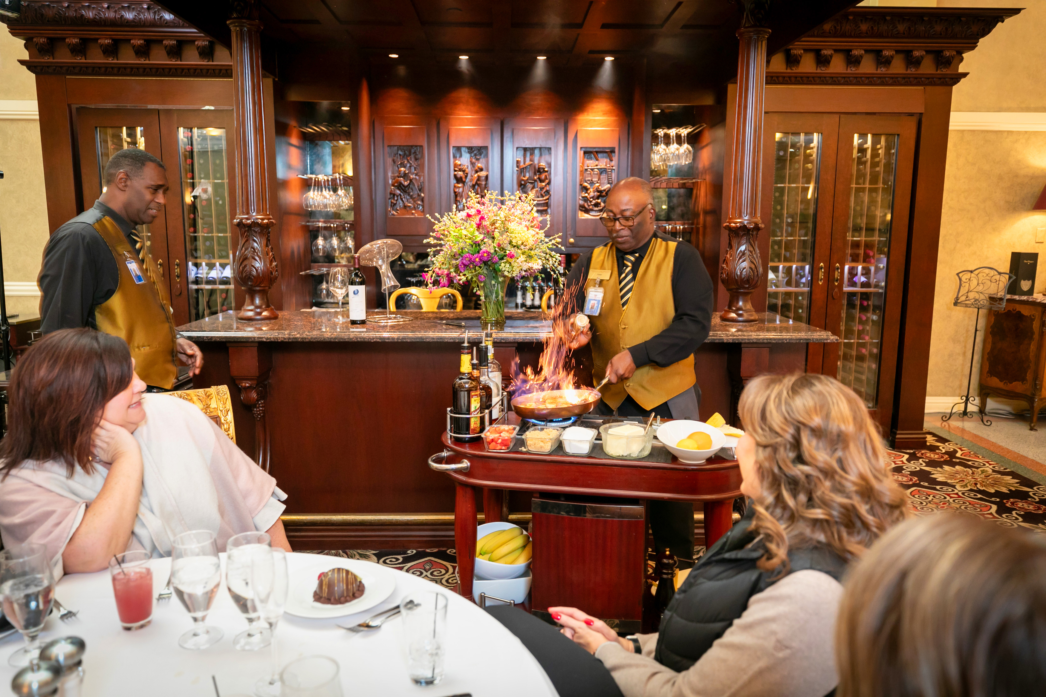 a man serving food in a restaurant