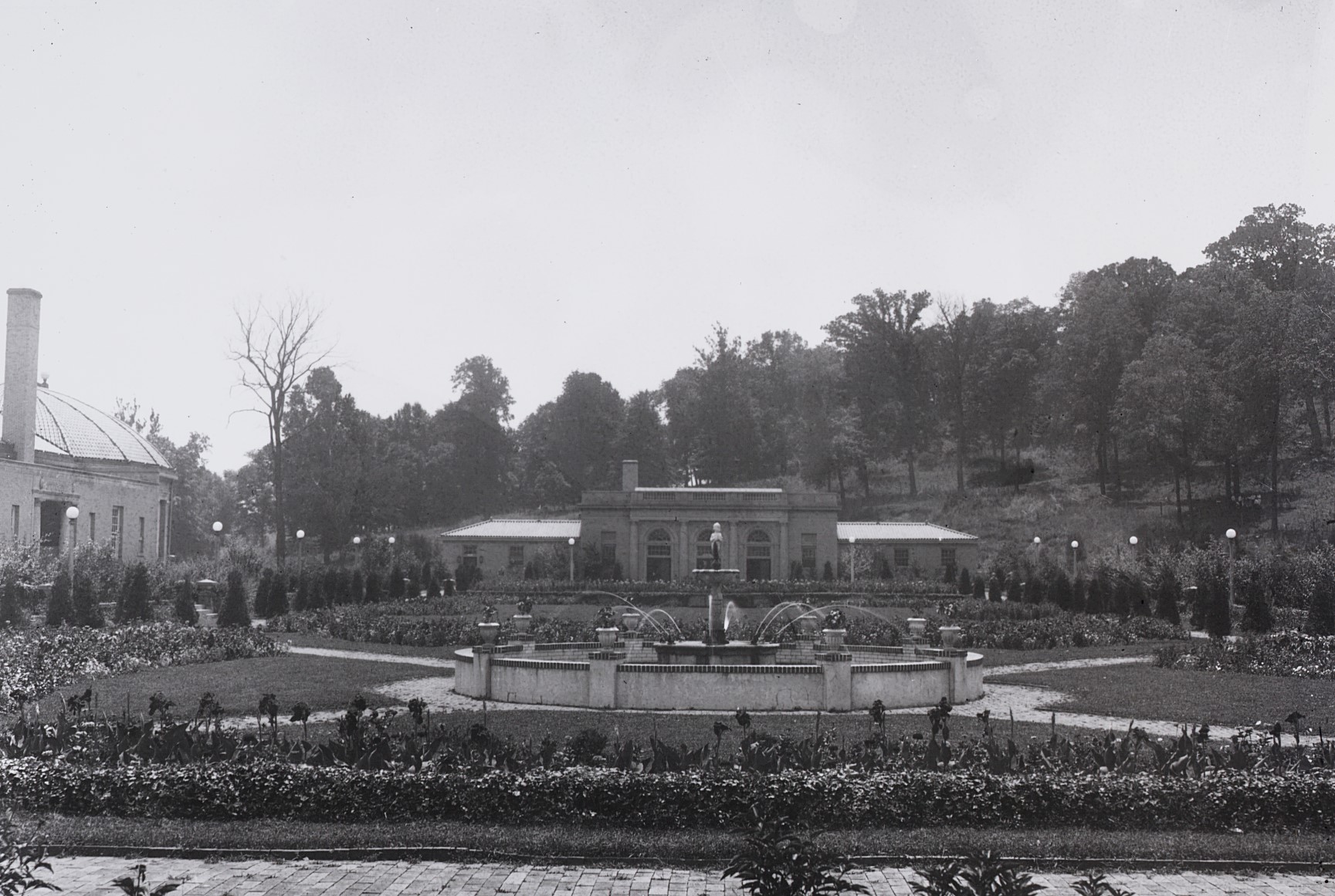 a building with a fountain in front of it