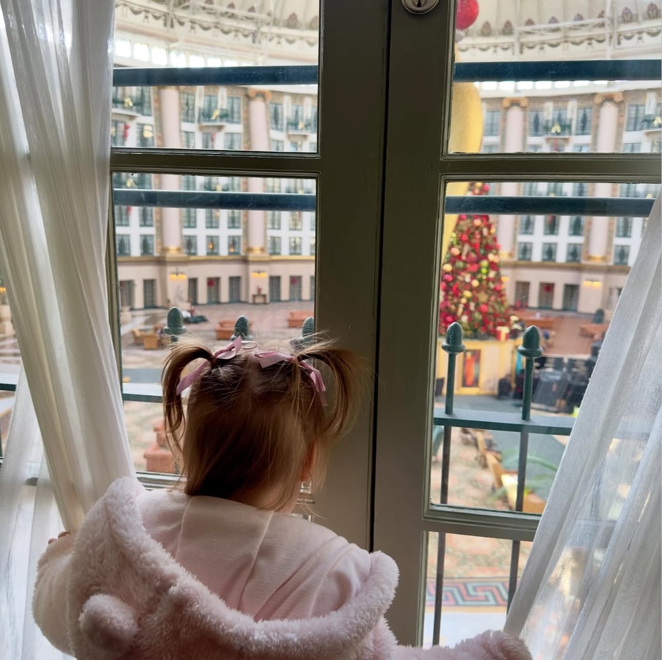 a child looking out a window