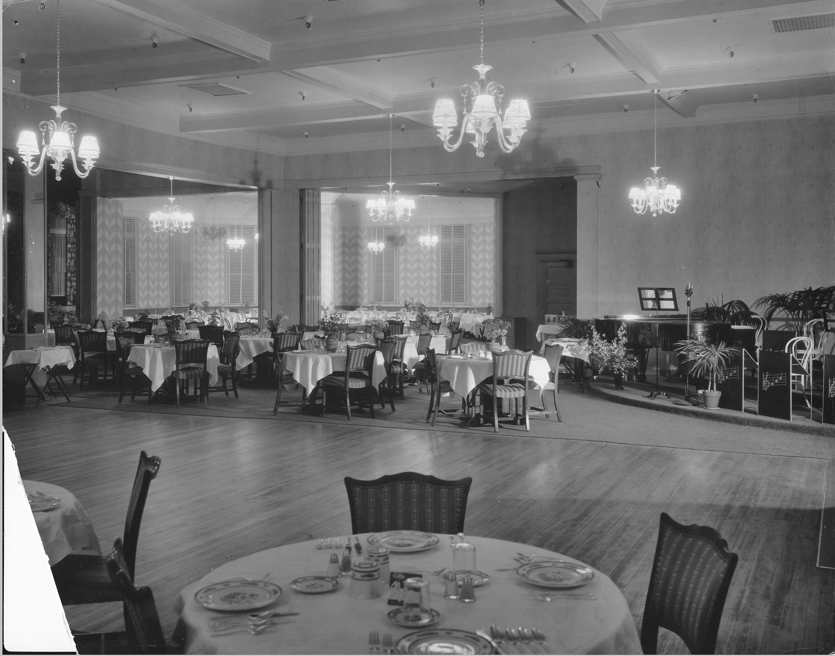 a room with tables and chairs