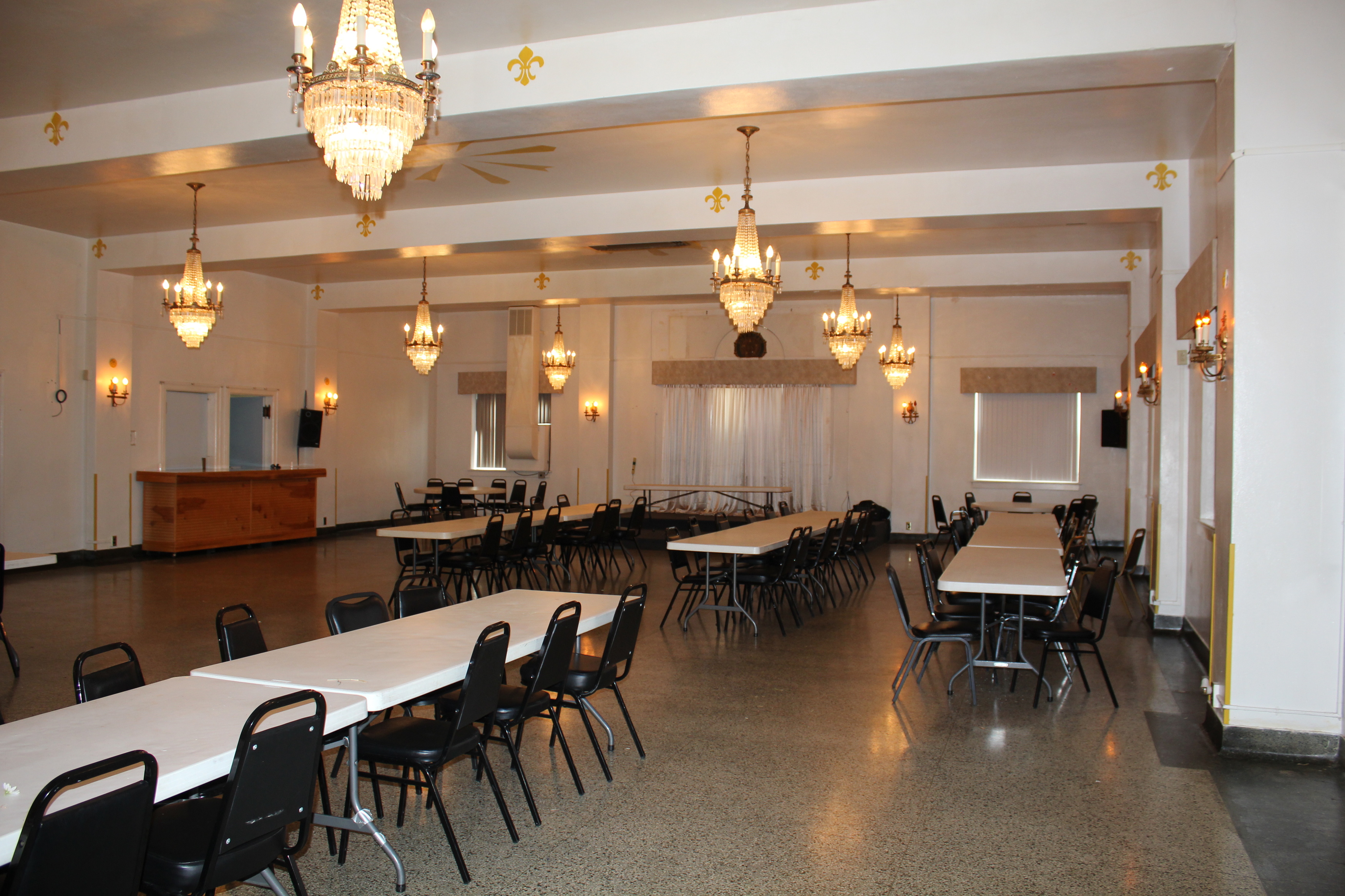 a room with tables and chairs