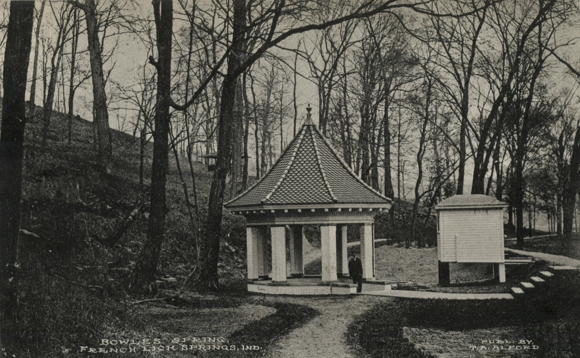 a man walking in a gazebo