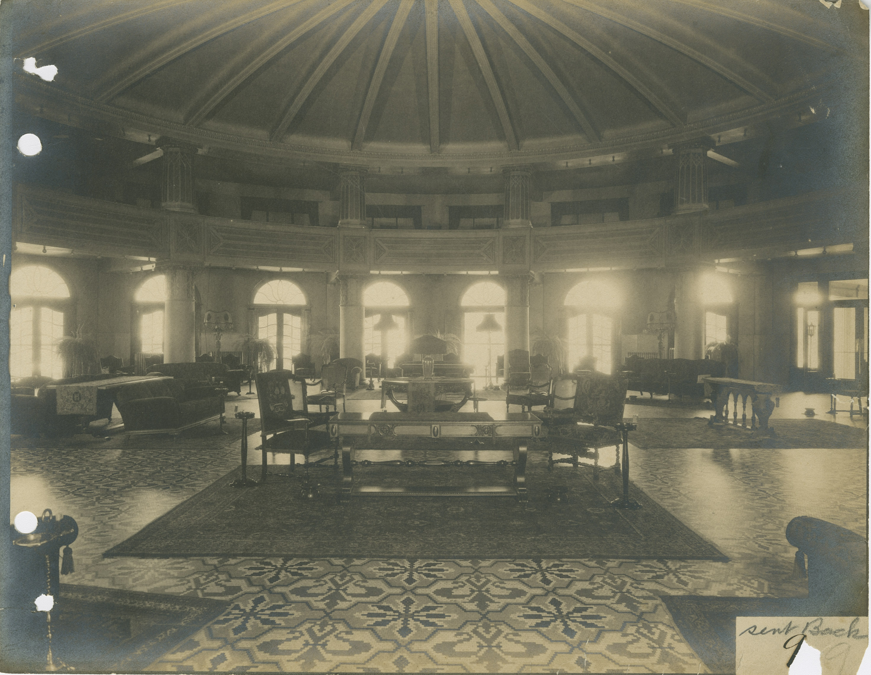 a room with a circular ceiling and a large round ceiling