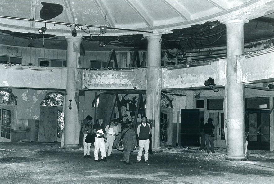 a group of people standing in a room