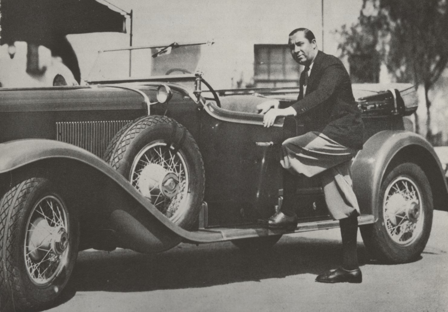 a man standing on a car