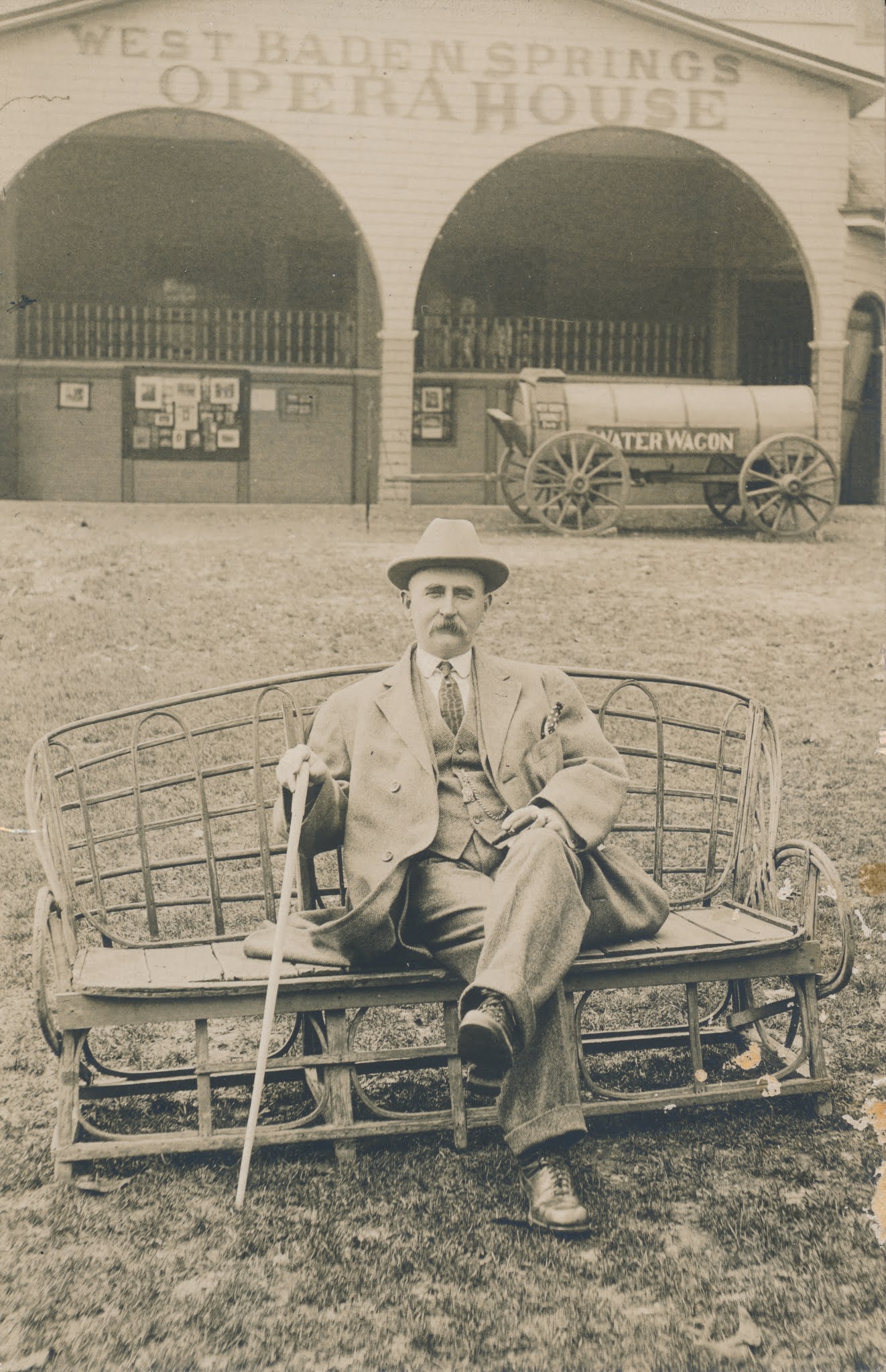 a man sitting on a bench