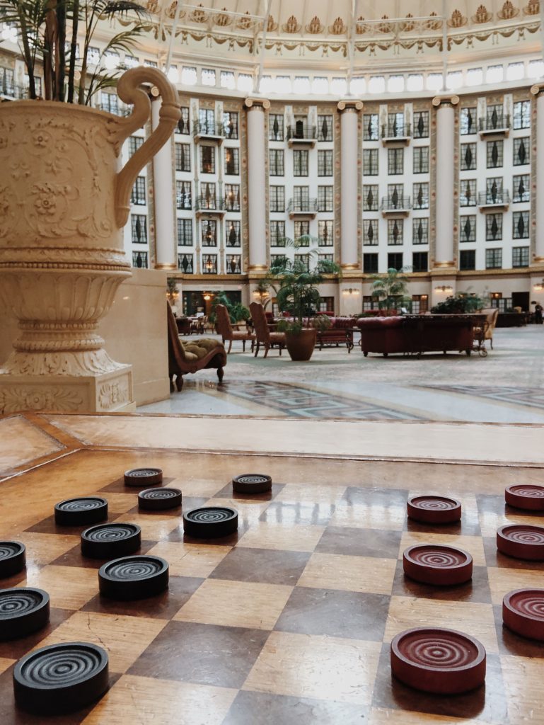 a checkers game in a large building