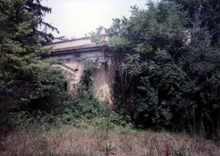 a building surrounded by trees