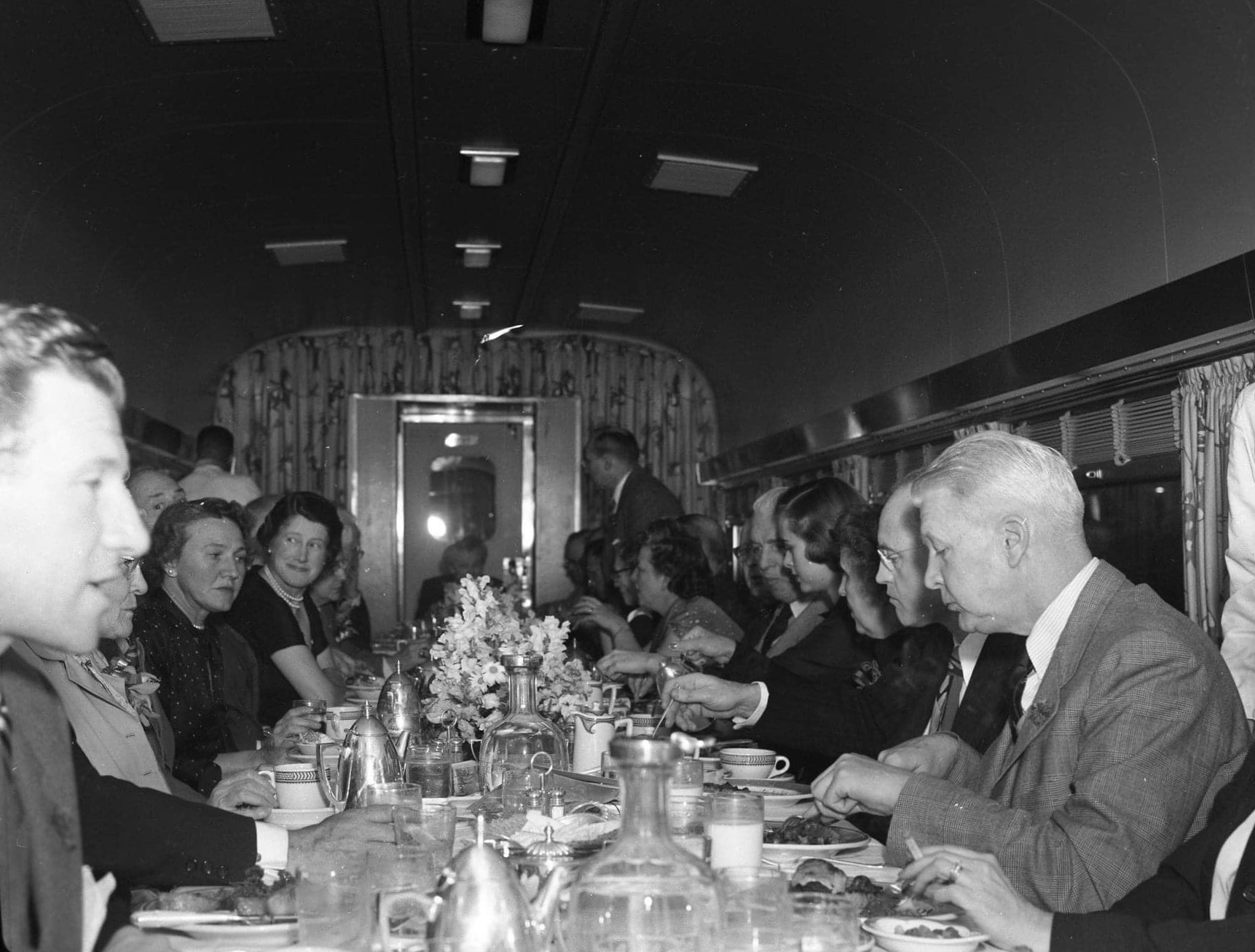 a group of people sitting at a table