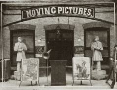 a black and white photo of a movie theater